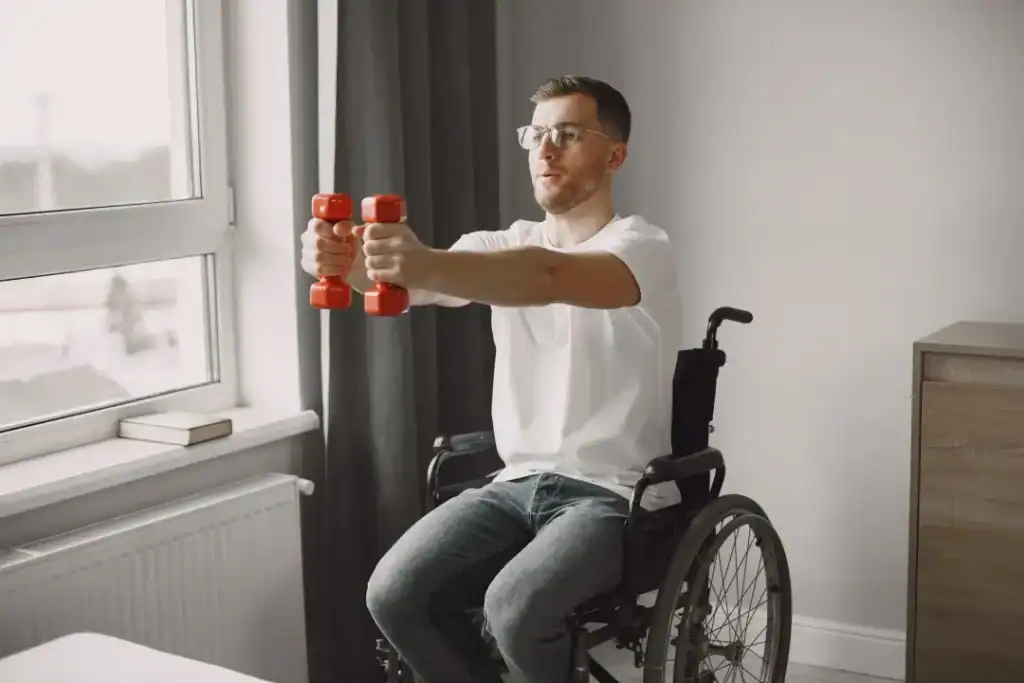 Empowering Weight Loss: A Comprehensive Guide for Individuals with Disabilities 1 Image of man doing exercise in his wheelchair to aid weight loss Chelmsford