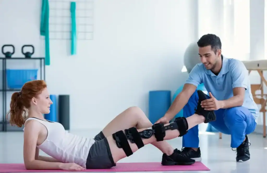 Debunking Meal Timing Myths: The Truth About Muscle Recovery 1 Woman having treatment to help muscle recovery Chelmsford after an injury