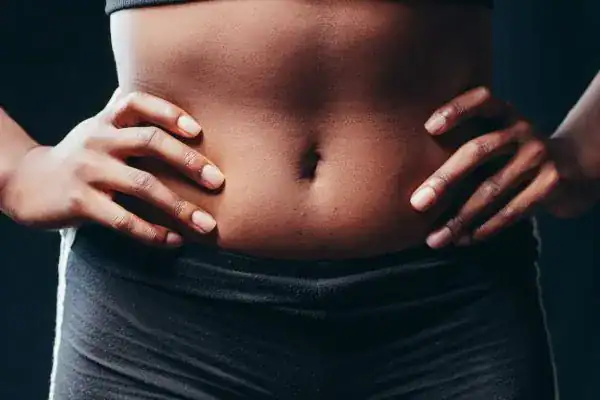 Toning Your Stomach: The Ultimate Guide to Achieving a Sculpted Stomach While Shedding Pounds 1 Image of a toned stomach after non surgical treatment Chelmsford